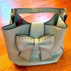Betsy Johnson mint green and gold accent purse with beautiful pink interior!